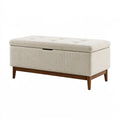 Banc de rangement 110 x 45 x 50 cm en tissu beige avec pieds en bois capitonnés